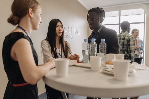 Professional networking event with job seekers building meaningful career connections and discussing opportunities